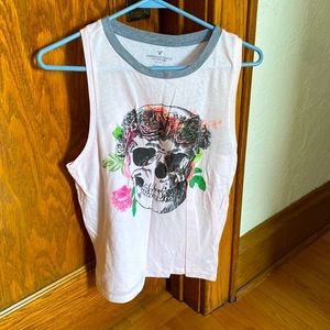 Womens size Med American Eagle muscle tee. Light pink w gray neck trim.